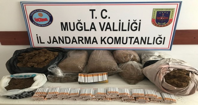 JANDARMA ve KOM'BASKIN'INDA KAÇAK SİGARA VE TÜTÜN ELE GEÇİRİLDİ..