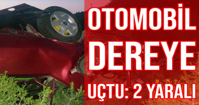 OTOMOBİL DEREYE UÇTU: 2 YARALI